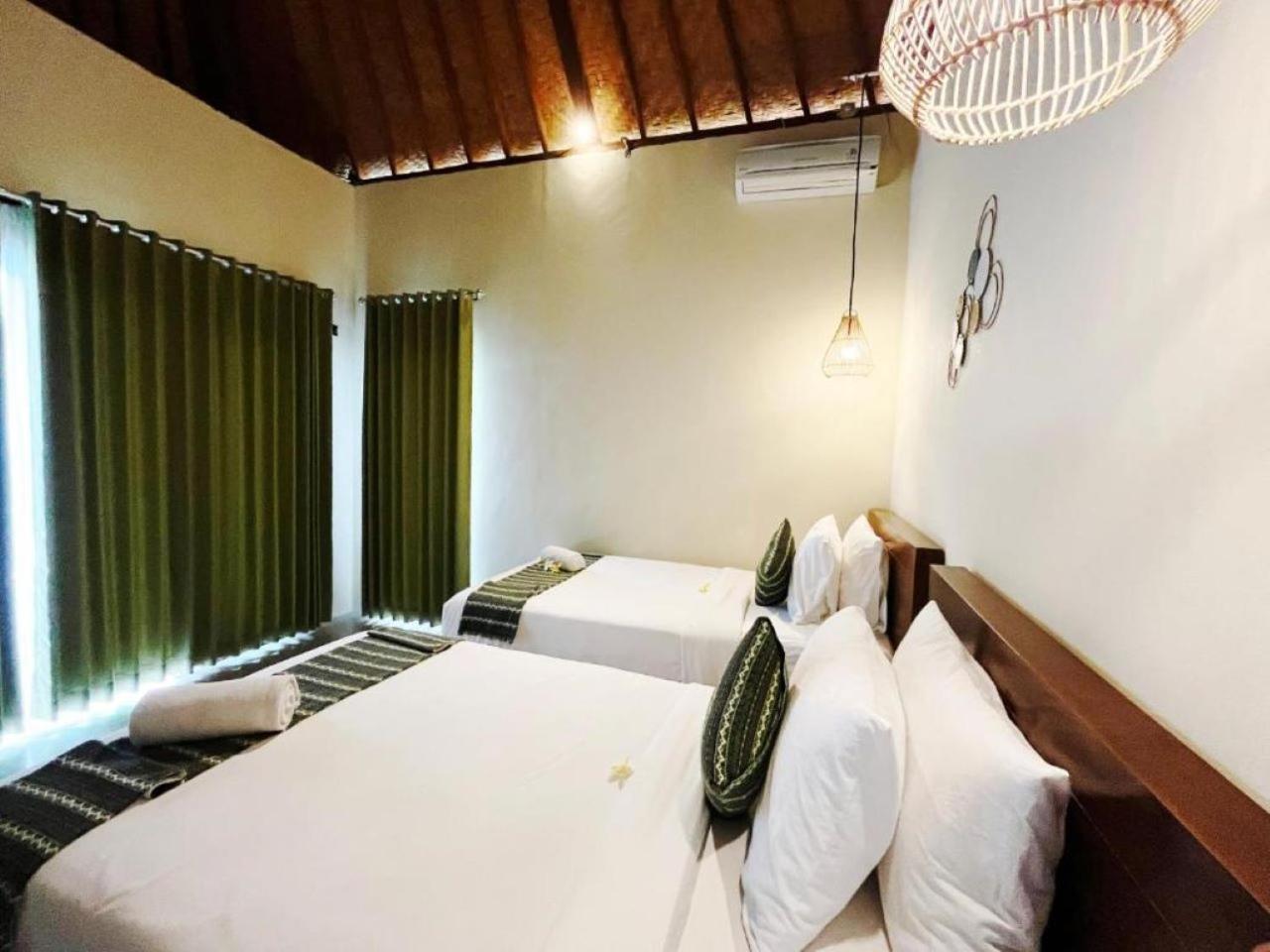 Hotel Wk Gamat Garden Toyapakeh Esterno foto